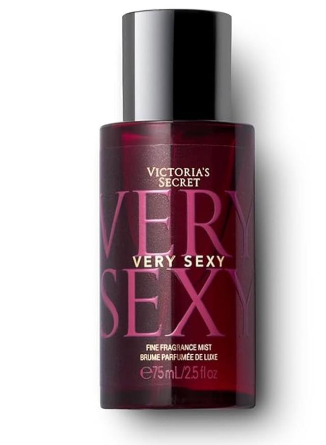 Woman applying Victoria's Secret Bombshell Mini Fragrance Mist