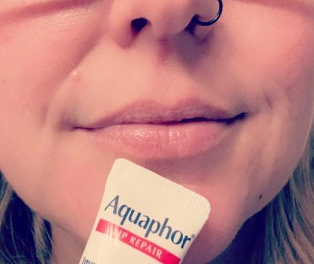 Aquaphor Lip Repair applied on lips