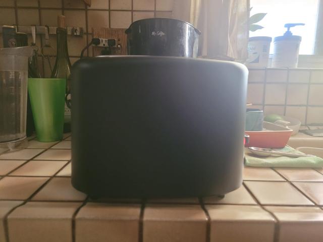 Amazon Basics 2-Slice Toaster in use