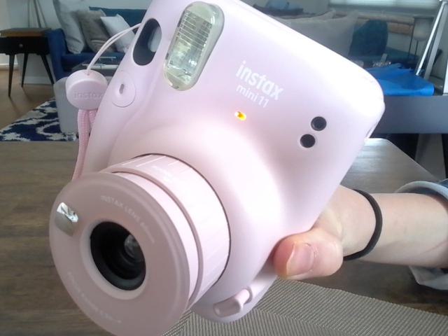 Fujifilm Instax Mini 11 in use