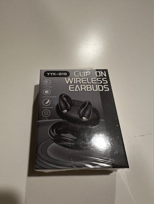 Ultra Open Ear Clip Earbuds in use