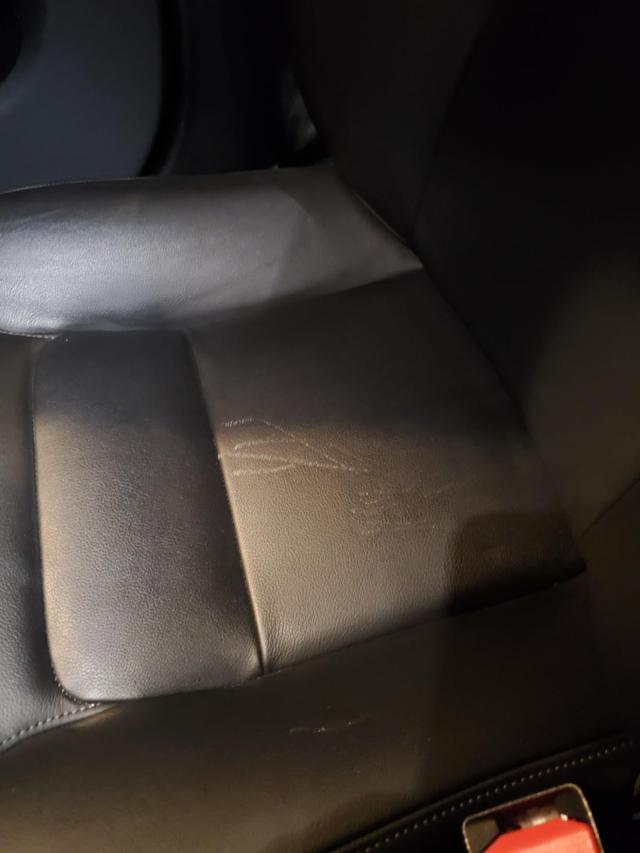 Before and after using KIWI Express Shoe Shine Sponge on car seats