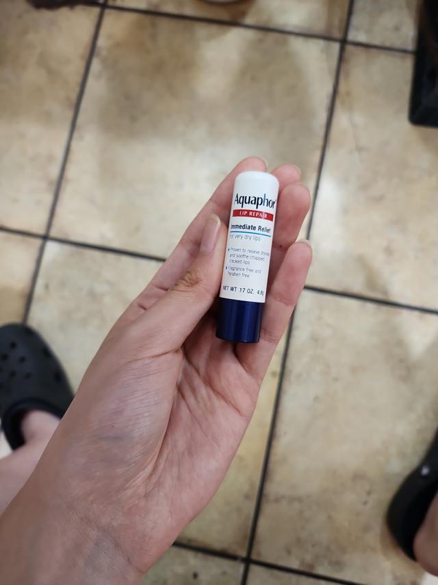 Aquaphor Lip Repair Stick application