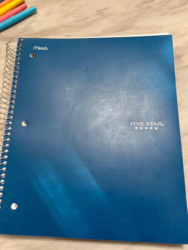 Five Star Spiral Notebook in a backpack