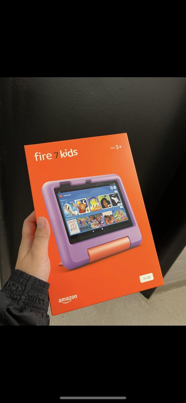 Amazon Fire 7 Kids tablet in hand