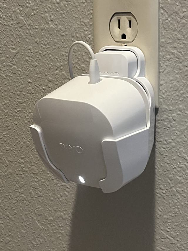 Wall mounted eero in hallway