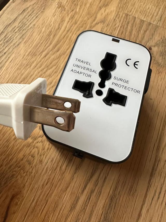 Travel adapter in use