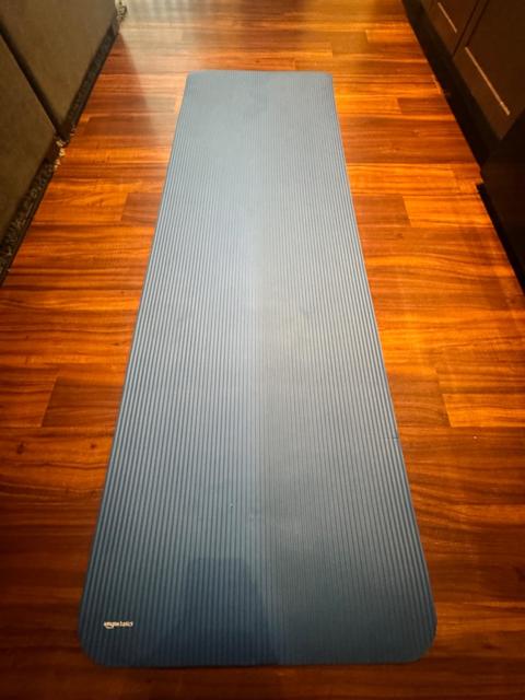 Amazon Basics Yoga Mat rolled up