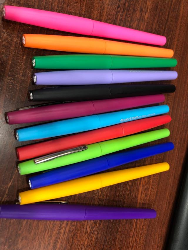 Happy Teacher Using Flair Pens