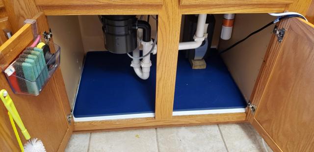 Sdpeia Under Sink Mat installed in a cabinet