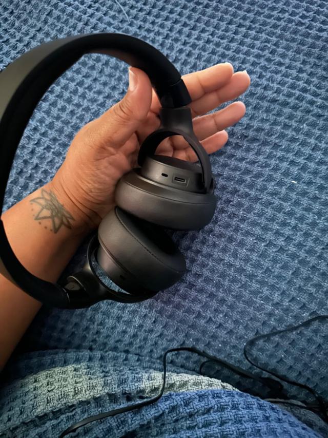 JBL Tune 760NC headphones worn by a person