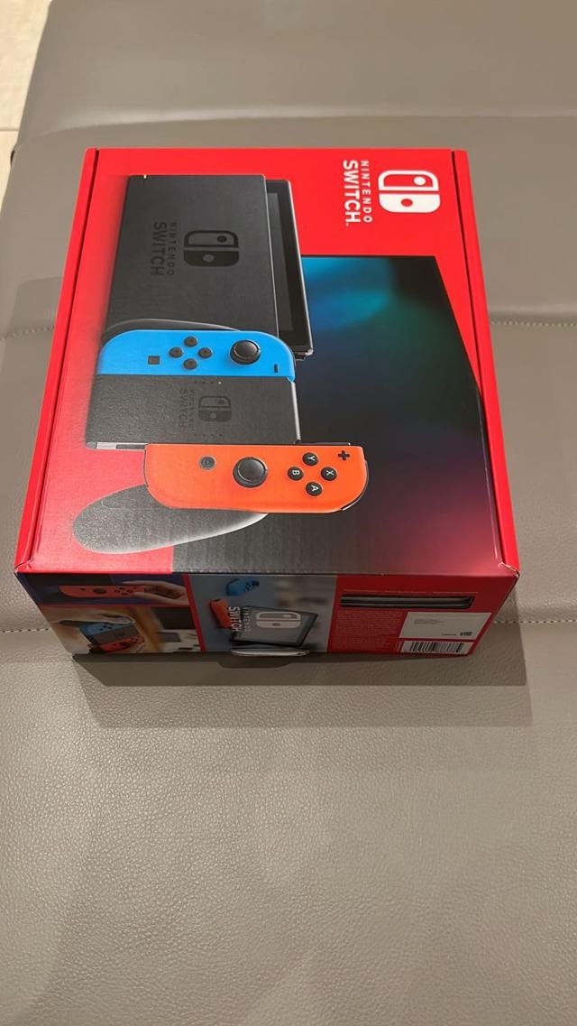 Nintendo Switch with Neon Blue and Red Joy-Con