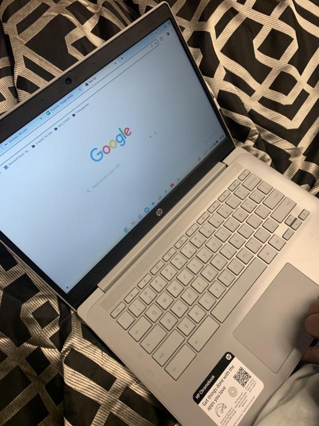 Patient Child Using Chromebook