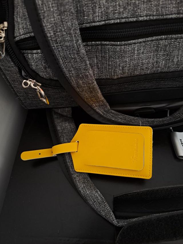 Travelambo Luggage Tag on a suitcase