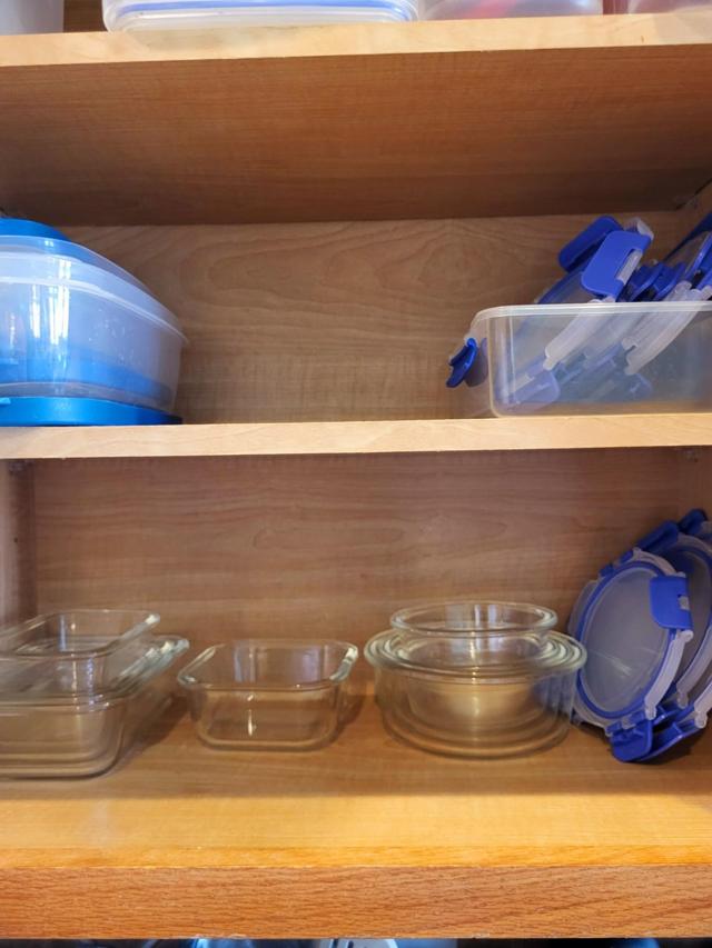 JoyJolt Glass Food Storage Containers stacked in a refrigerator