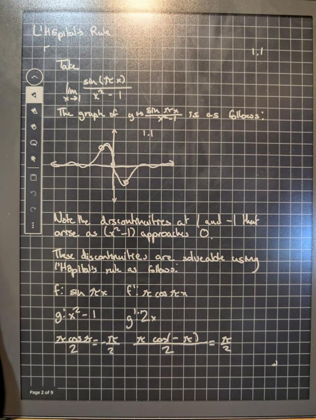 Son using Kindle Scribe