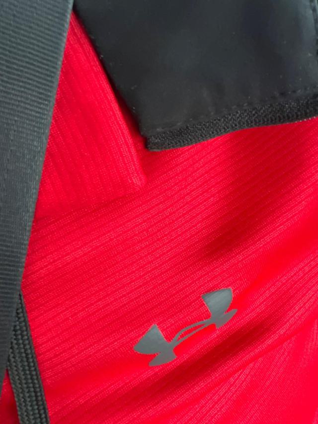 Close-up of Under Armour Men's Tech Golf Polo fabric