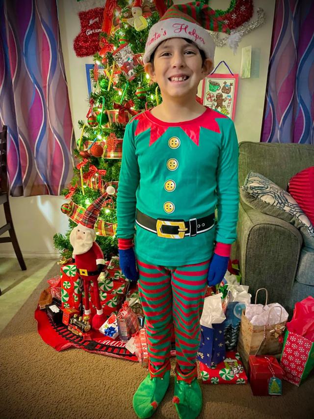 Happy kids in Christmas pajamas